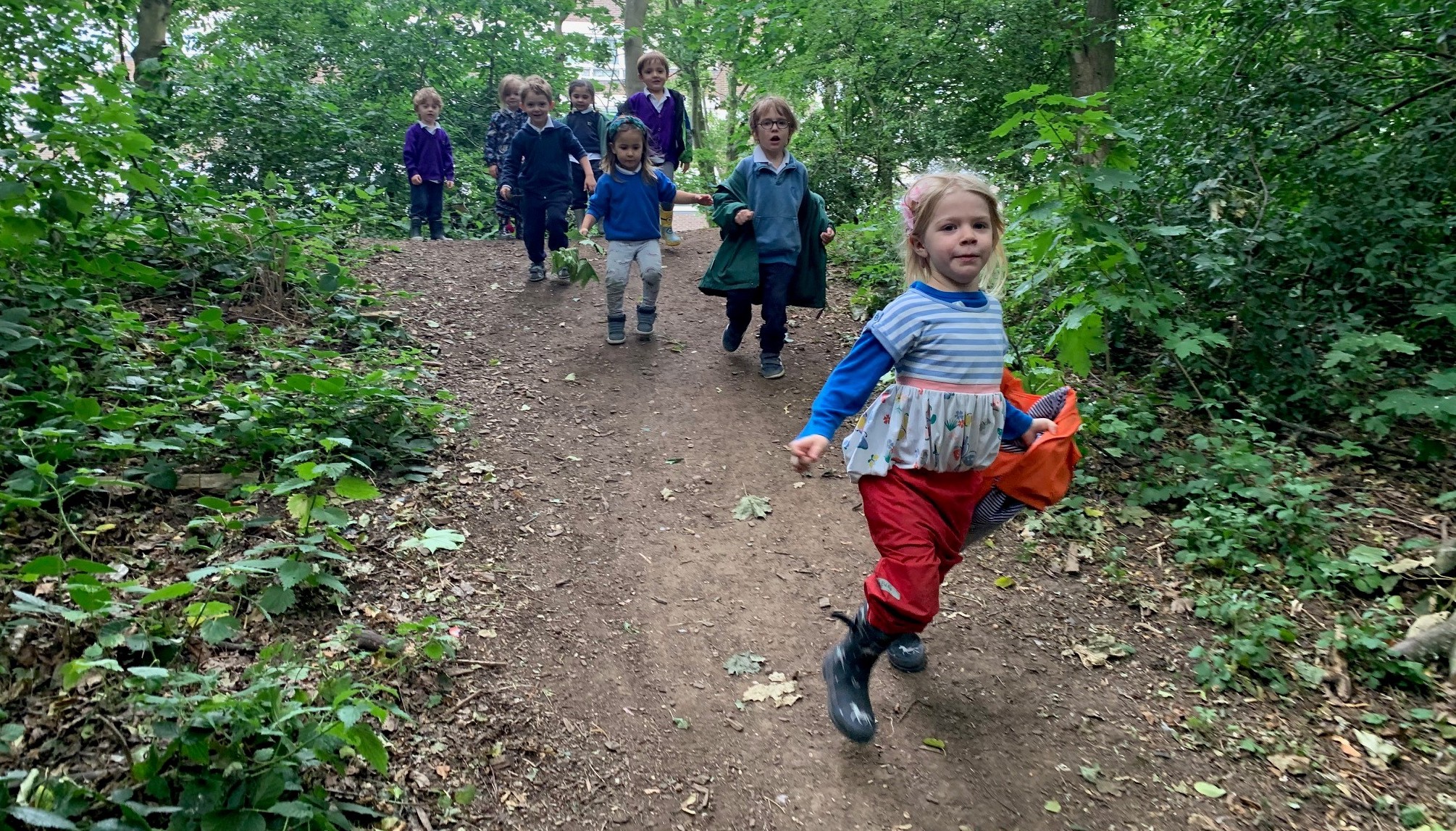Children Exploring Forest School in the Gower School, a Montessori Nursery in London.