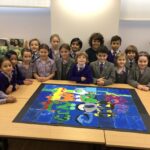 The Gower School Form 2 children with ther winning piece of collaborative artwork.