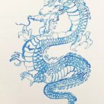 The blue ink drawing of a dragon which received a Highly Commended from the ISA National Art Competition 2022.
