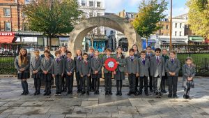 Students Holding a Wreath