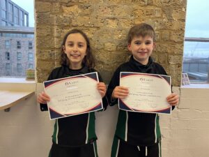 Students Holding Certificates